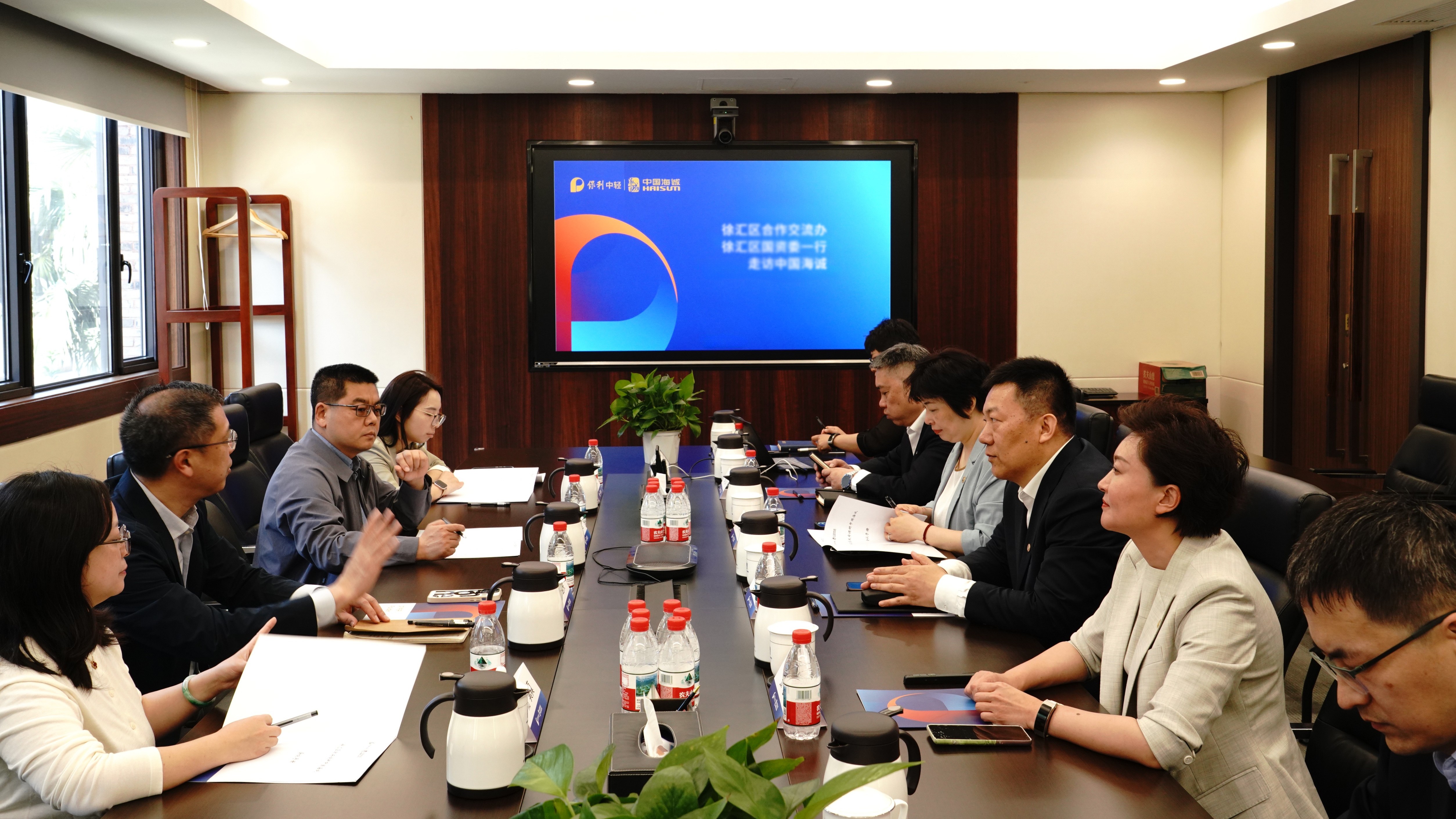 徐汇区合作交流办、徐汇区国资委一行走访中国海诚